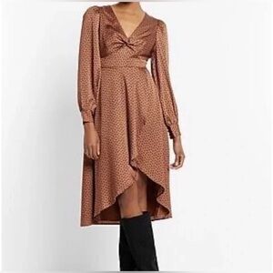 Express polka dot long sleeve twist front midi dress.